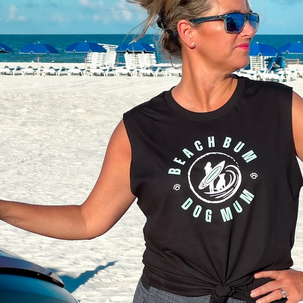 beach bum dog mom surfer style print on unisex muscle tank.  light aqua print on black tank top.  dog mom shirt.  beach bum.  beach apparel.