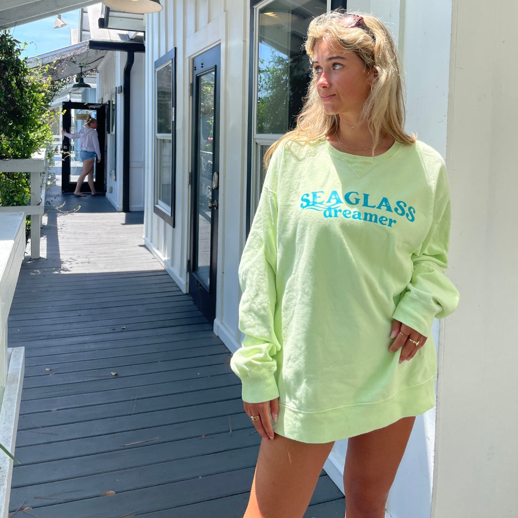 seaglass dreamer turquoise blue text on a lemon citron colored sweatshirt.  oversized cotton sweatshirt.  beach apparel for beach trips.