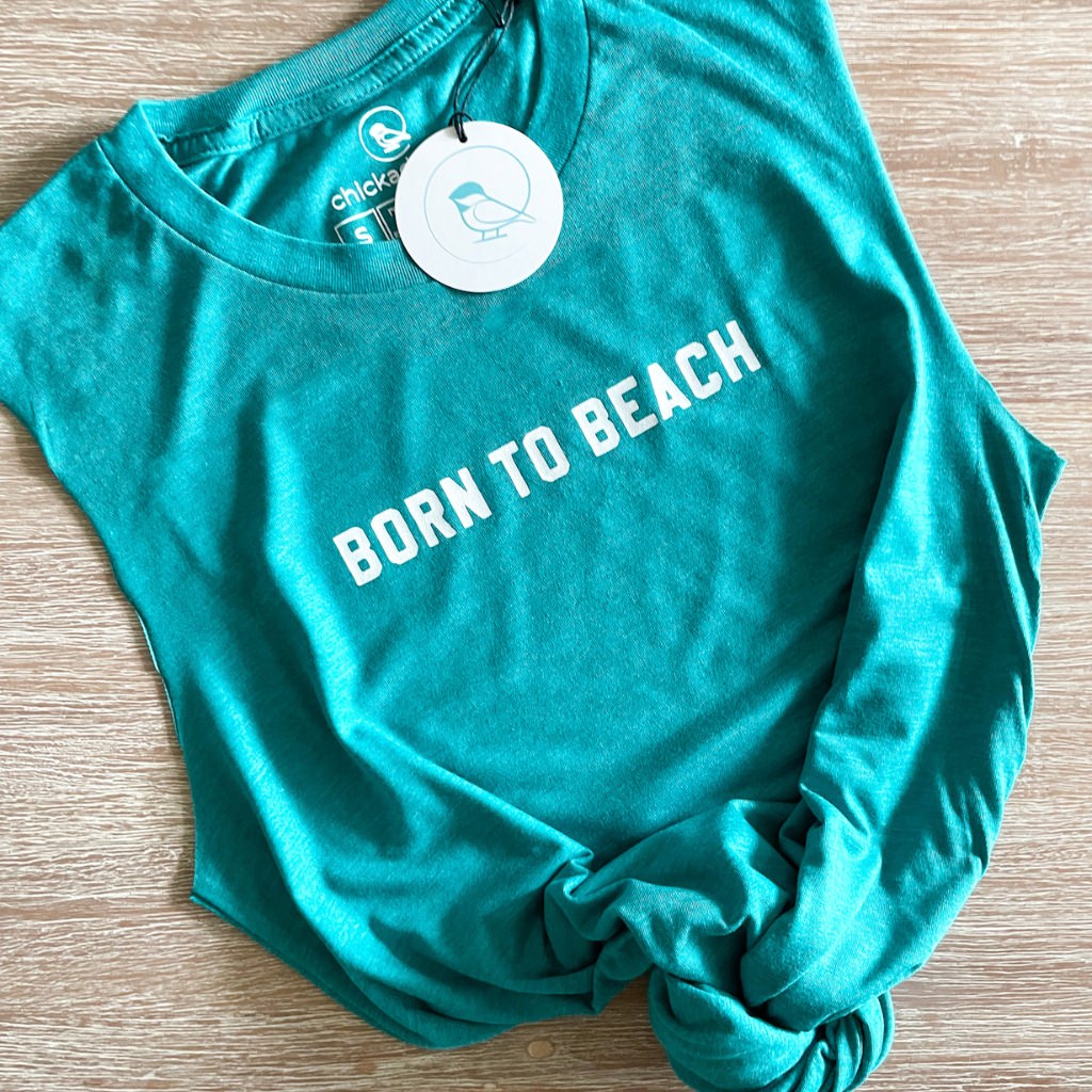 born to beach white text on raw cut unisex muscle tank.  turquoise green colored super soft beach tank.  beach apparel.  tie knot muscle tank for women.