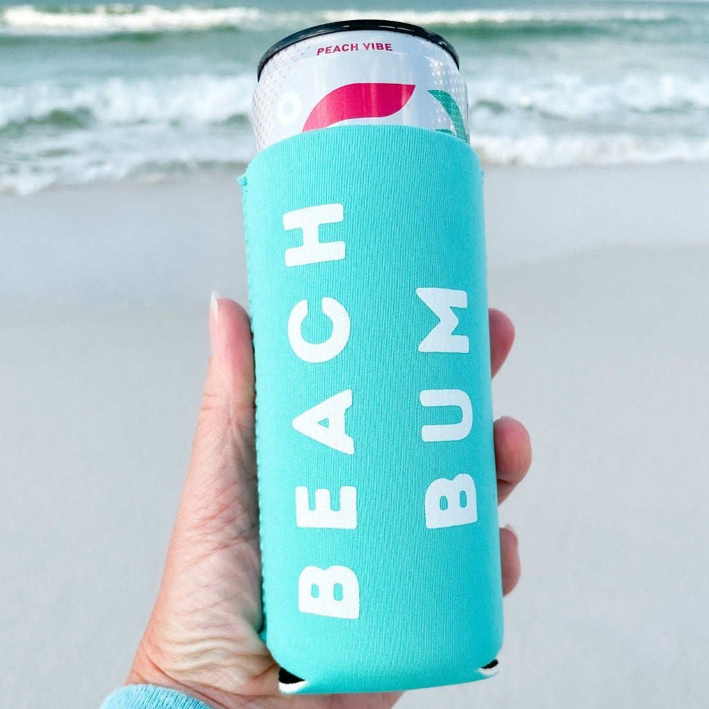 beach bum drink cover sets.  neoprene drink cover.  aqua blue slim koozie cover with beach bum white text.  beach accessories.  drink cover sets for the beach.