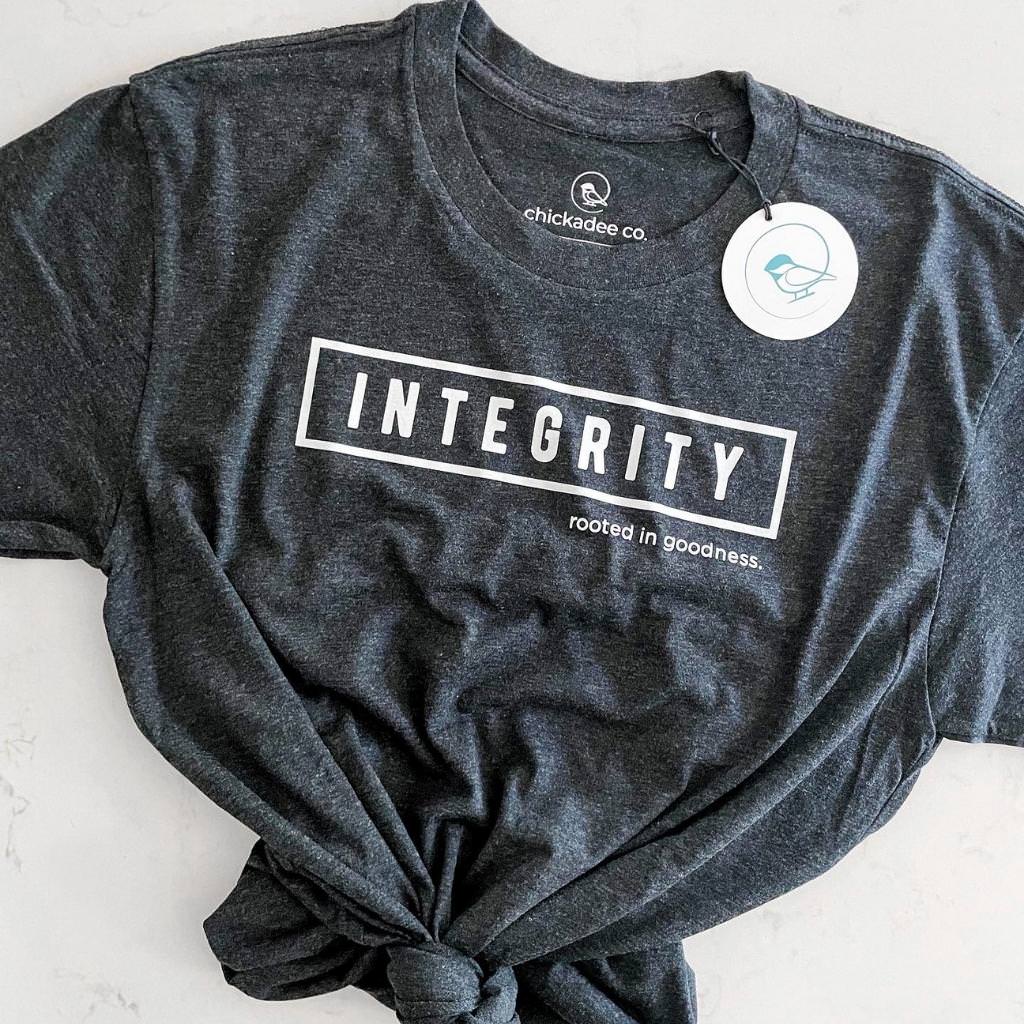 super soft inspirational tshirts for women.  INTEGRITY rooted in goodness is printed in white ink on this vintage black tshirt.