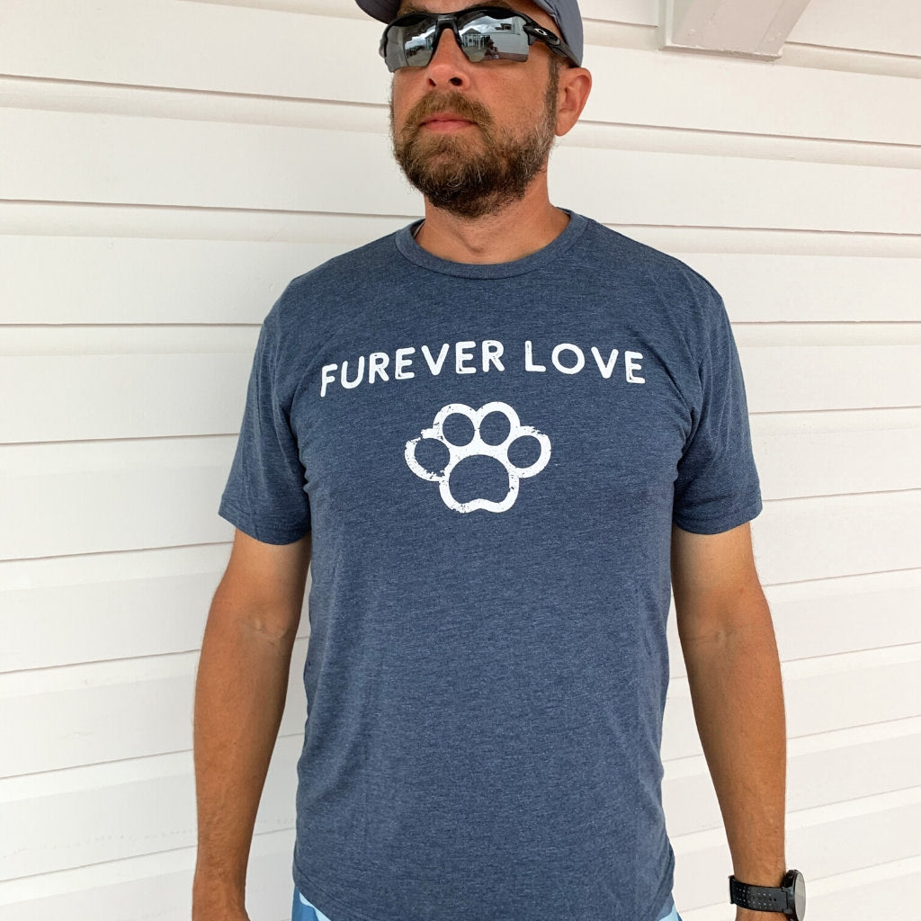 super soft vintage tshirt in blue.  unisex blue triblend tshirt for men and women.  dog lovers tshirt with furever love quote.  dog lovers tshirts.  furever love dog message.  apparel for dog lovers.  heathered blue tshirt with white screen printed design on front.  favorite tshirts.  