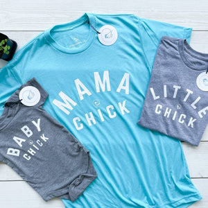 Mother & child matching tshirts.  MAMA CHICK is printed in white text on the front womens tshirt, LITTLE CHICK is printed on the childs tshirt and BABY CHICK is printed on the baby onesie.